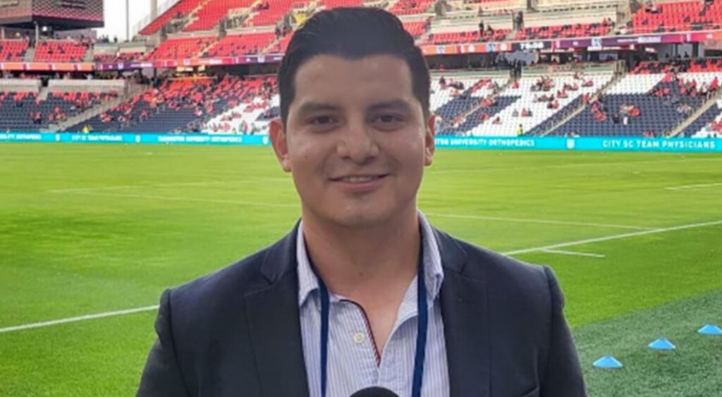 Adan Manzano standing on field