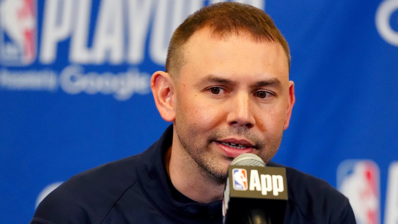 David Adelman at a press conference