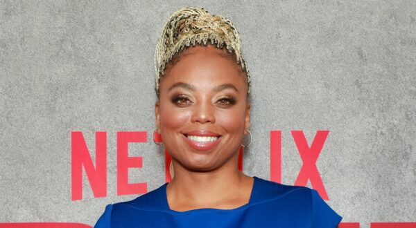 Jemele Hill posing in blue dress