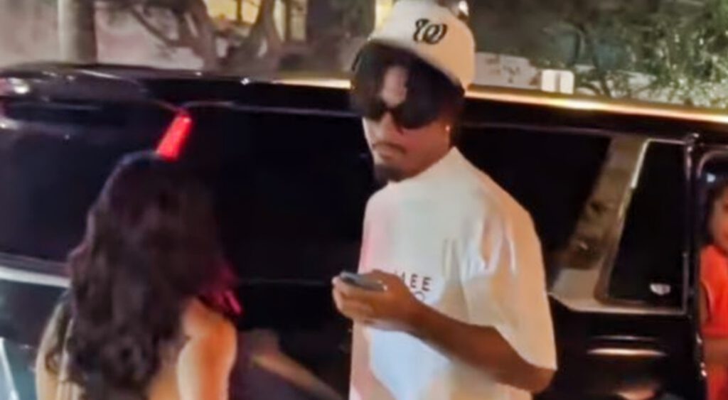 Jayden Daniels appearing to take woman's number