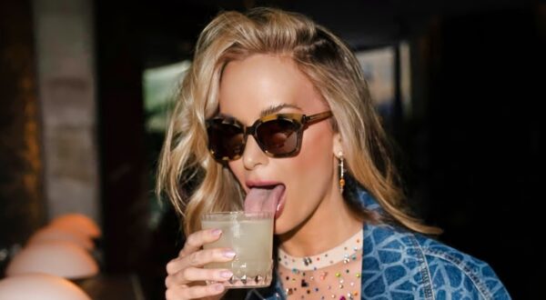 Jena Sims licking drink