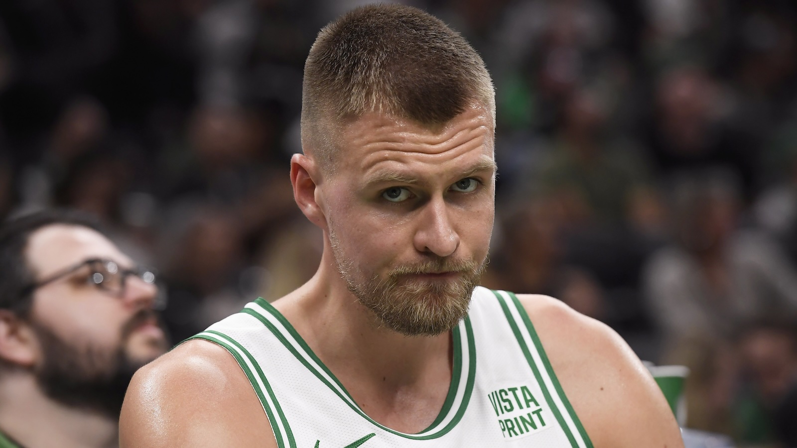 Kristaps Porzingis looks on