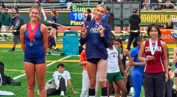 Reese Hogan and Ab Hernandez on podium