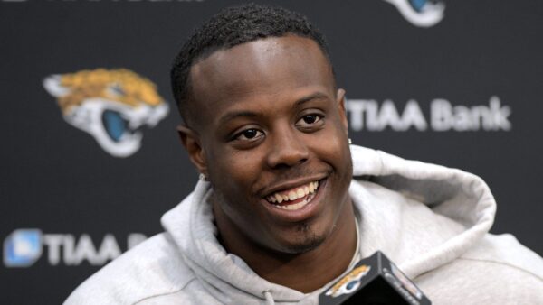 Travis Etienne at a press conference