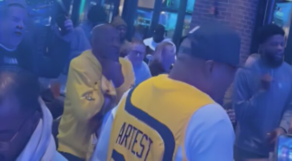 Tyrese Haliburton's dad celebrating in the bar