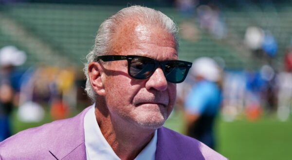 Jim Irsay looking on.