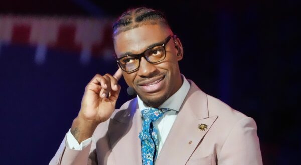 Robert Griffin III looking on.