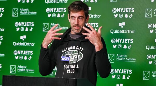 Aaron Rodgers speaks during a press conference.