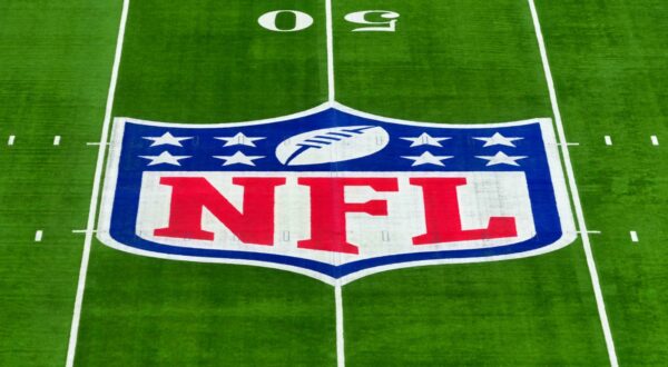 NFL logo shown on field. The league is introducing the Protector of the Year Award.