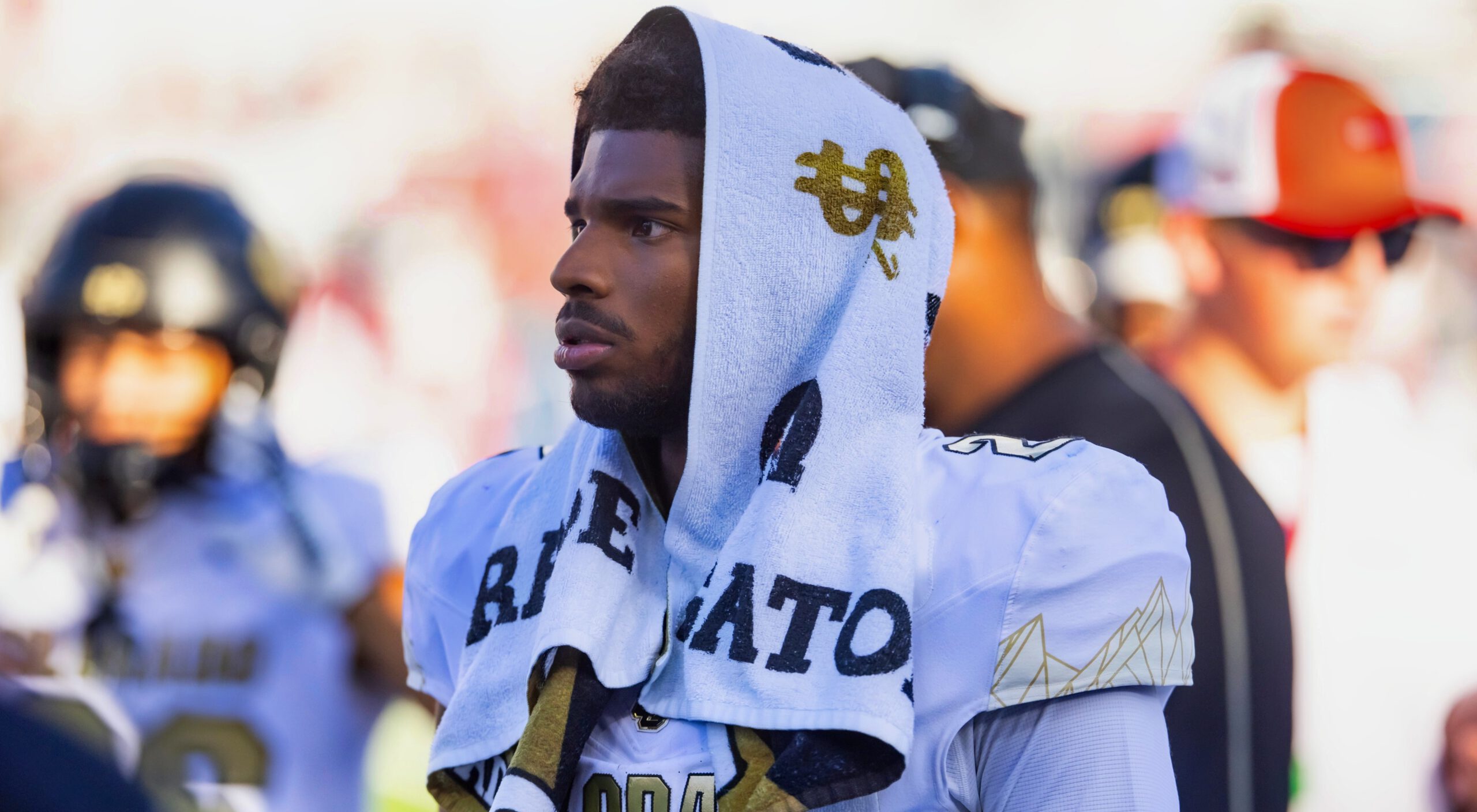 Shedeur Sanders with towel on his head