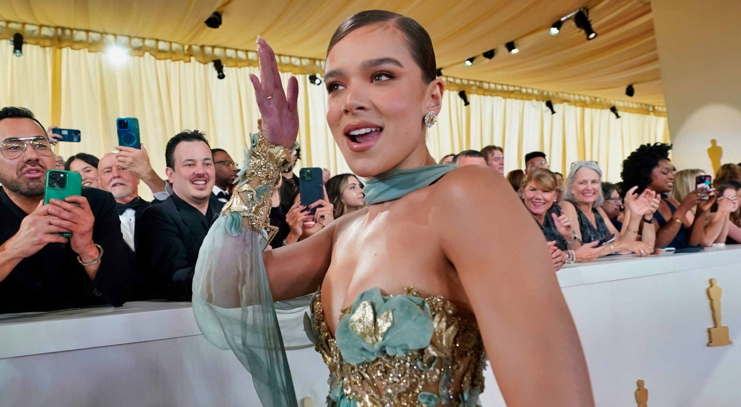 Hailee Steinfeld posing in dress