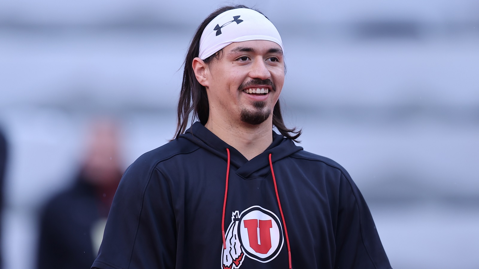 Utah QB Cam Rising in a headband