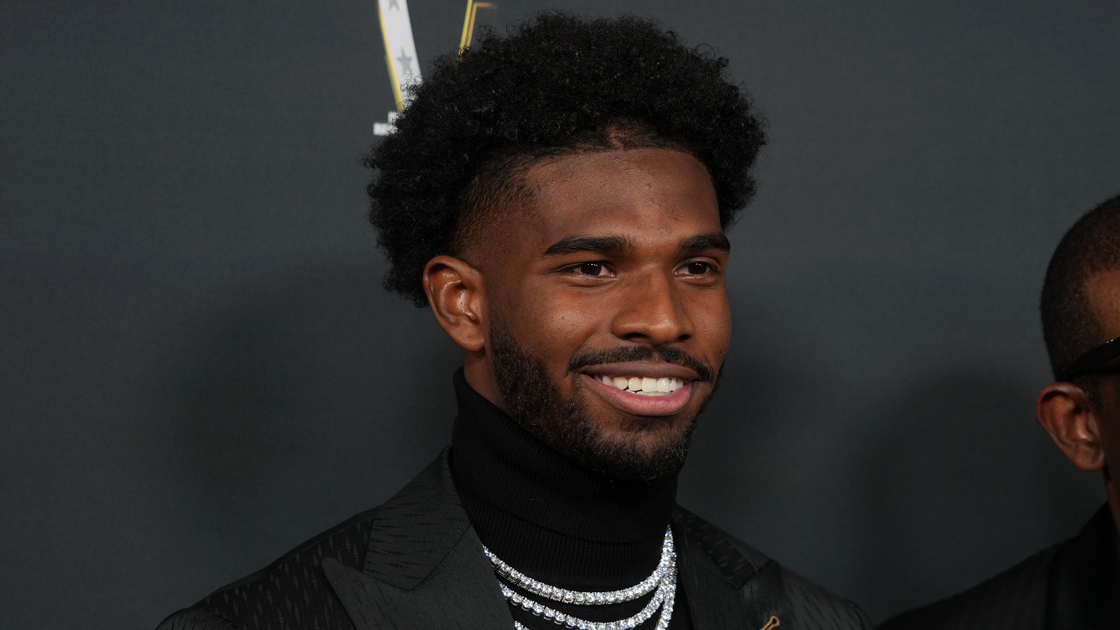 Shedeur Sanders smiles