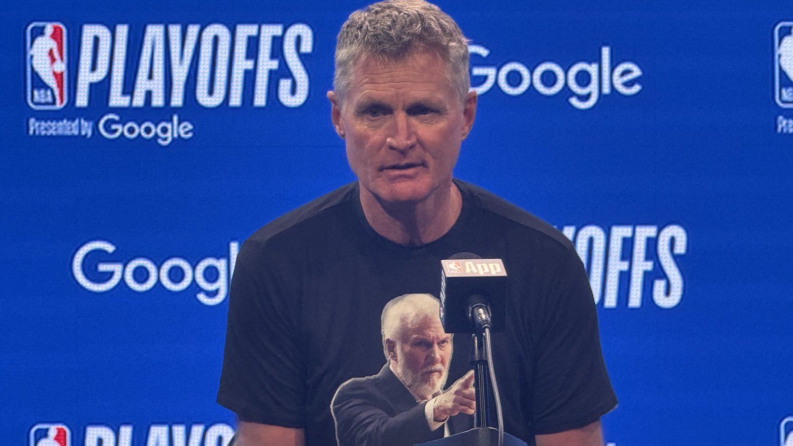 Steve Kerr wearing a Gregg Popovich shirt