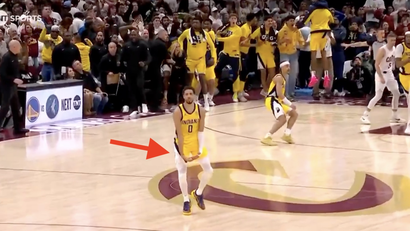 Pacers star Tyrese Haliburton celebrating with a big balls gesture