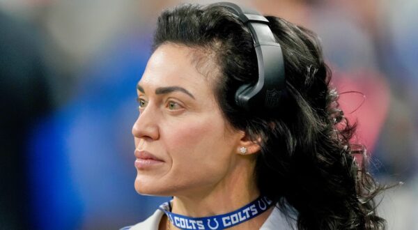 Carlie Irsay-Gordon looking on.